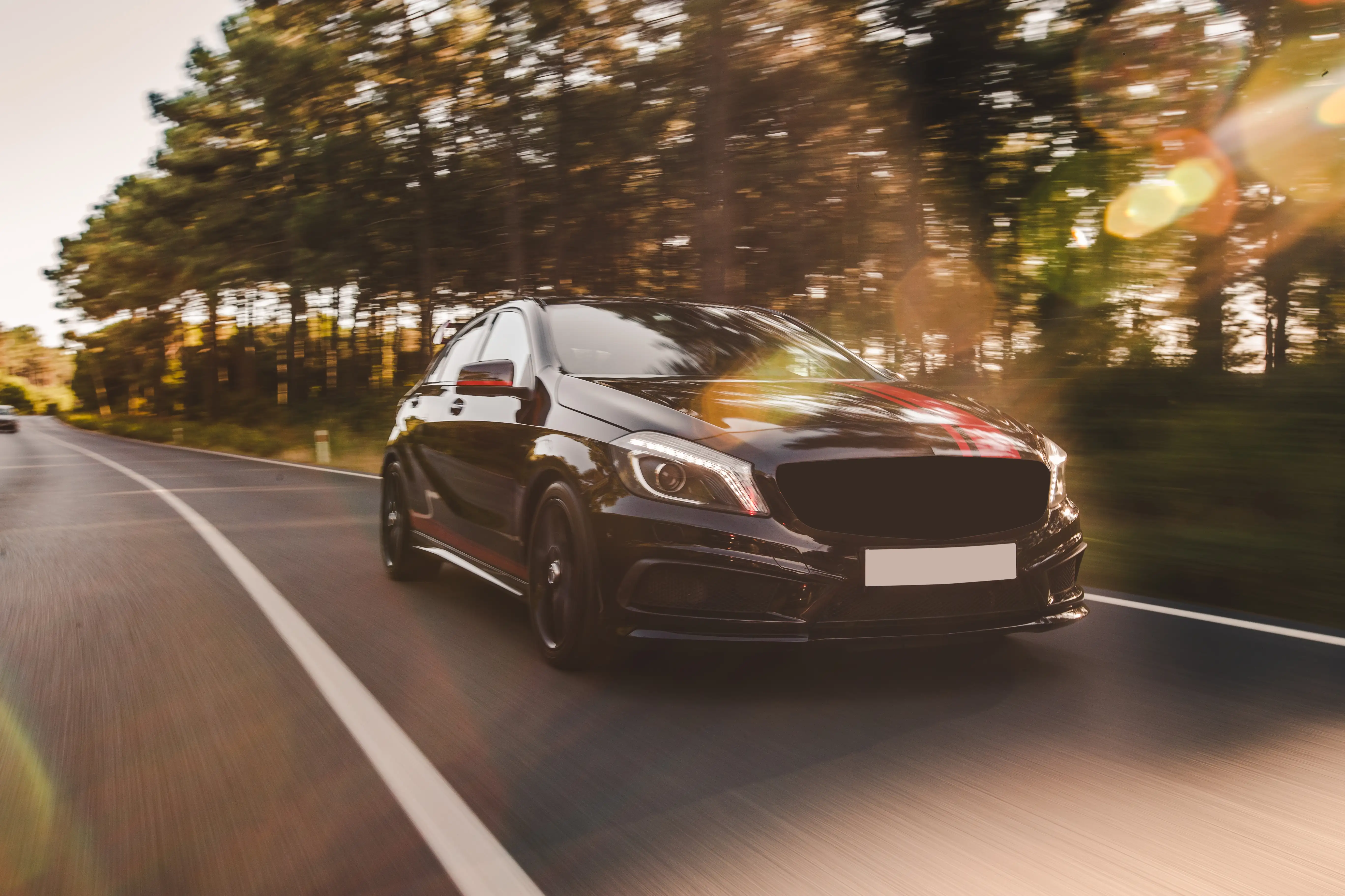 front view black luxury sedan road
