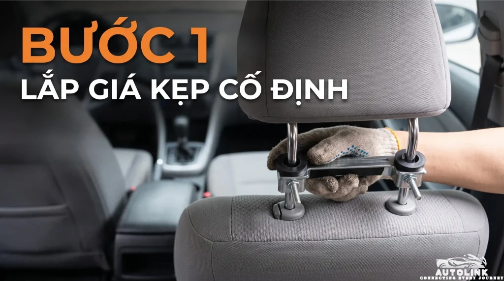 Lắp giá kẹp cố định vào thanh tựa đầu Lắp giá kẹp cố định vào thanh tựa đầu